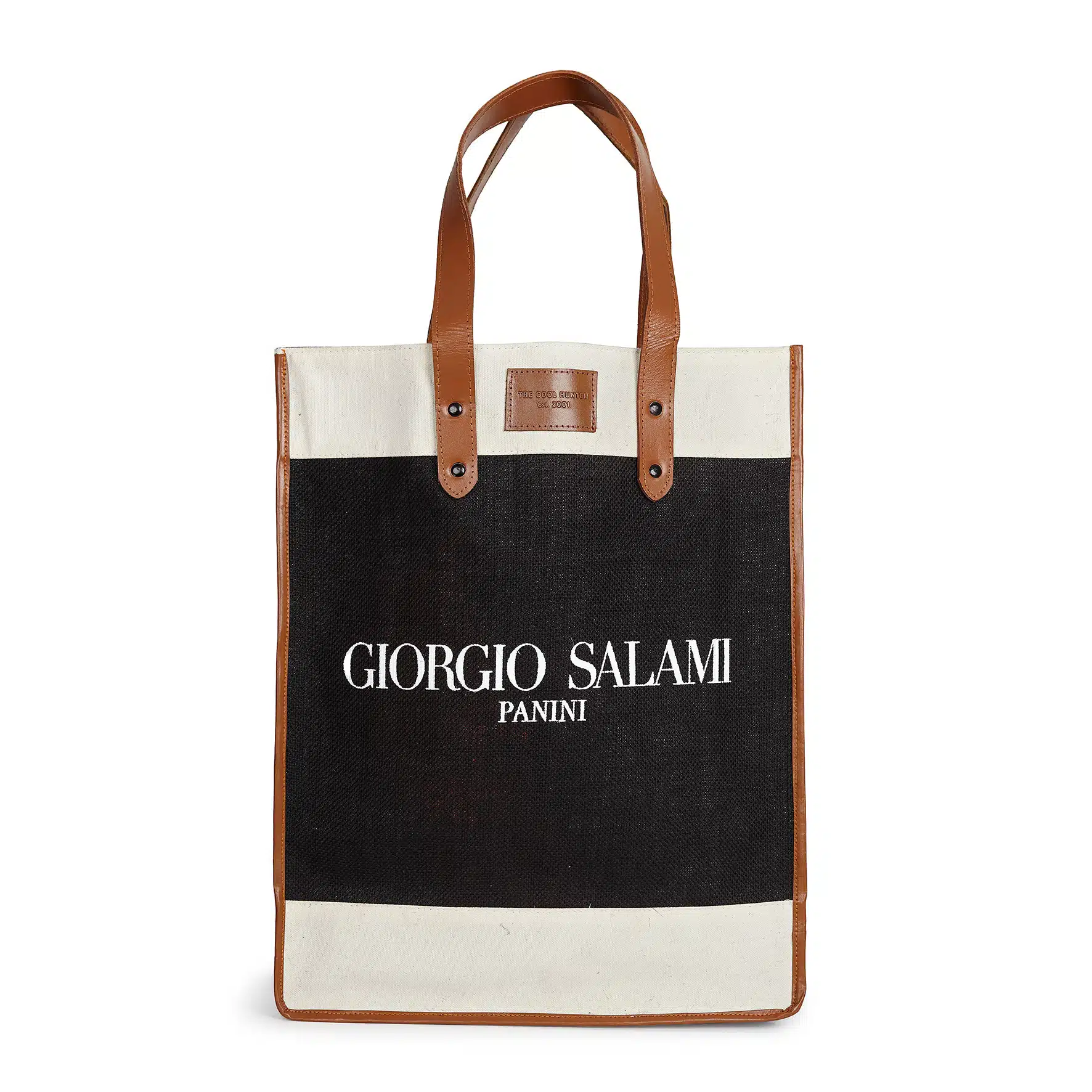 A stylish tote bag with leather handles and accents features a black main body with white text that reads, "GIORGIO SALAMI." The top and bottom sections of the bag are white, providing a striking contrast to the Giorgio Salami design.