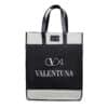 A black and white tote bag with the brand name 