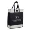 A sleek, black and white Valentuna with sturdy black handle straps, featuring VALENTUNA's unique fish-shaped logo and the word 