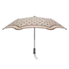 An open, stylish Karen Walker umbrella with a Metro Ecru/Chestnut canopy decorated with a detailed white lattice design, viewed from a slightly elevated angle, isolated on a white background.